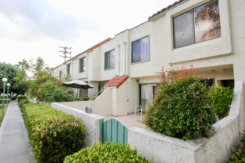 Row houses with individual compounds with garden in Strawberry hill