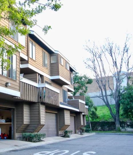THE FLAT WHICH IS IN GARDEN GROVE, SHOWS THE ROADWAY WITH LOT OF TREES, AND PLANTS
