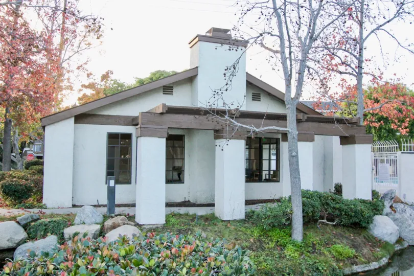 THE HOUSE IN THE VILLAS WITH THE ROCKS, PLANTS, TREES
