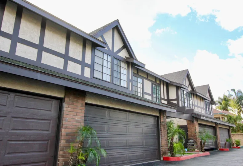Brown color exteriors of well designed house in Tudor estates community