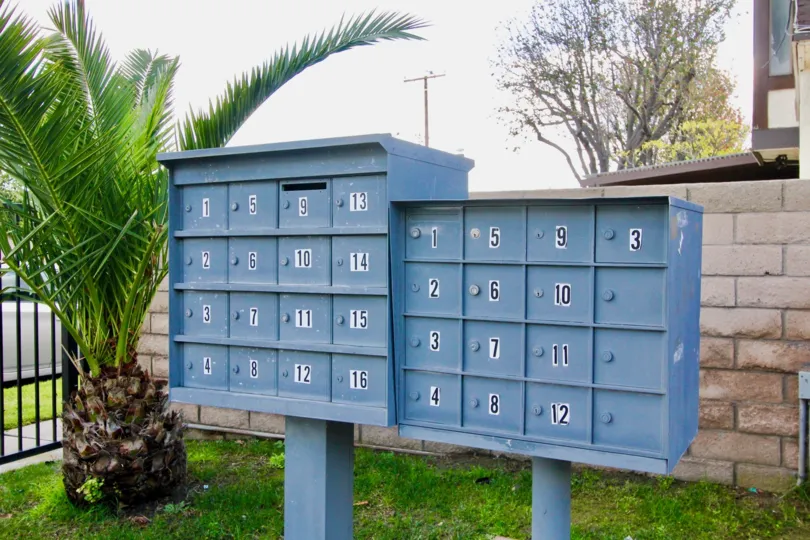 There are many postal boxes placed in front of the entrance in Tudor Estates