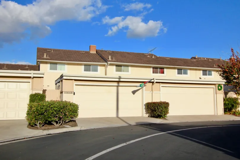 A warm summer day at the Valley View Park in Garden Grove, CA overlooking a duplex.