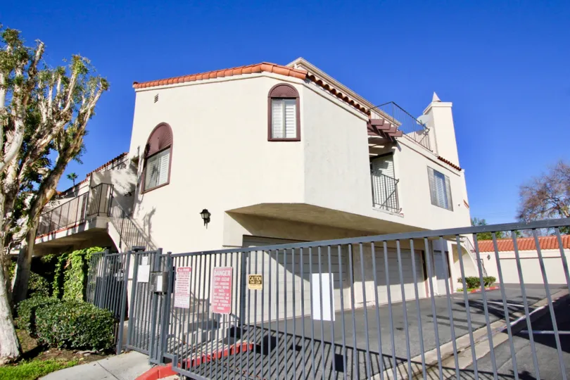 House at the Villa Grande in Garden Grove with little trees and road