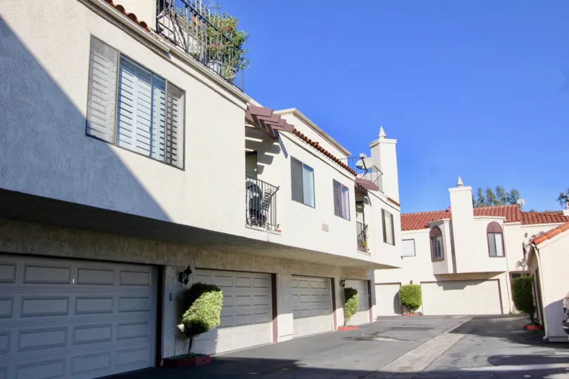 A row of garages on a sunny day in the Villa Grande community
