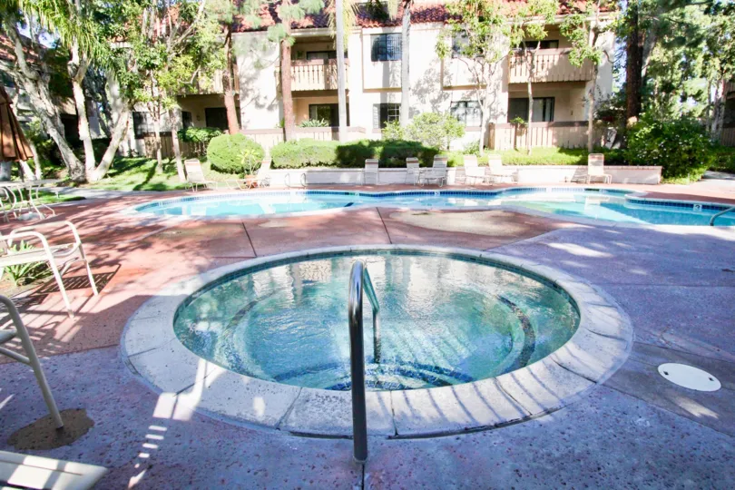 THE HOUSE IN THE VILLAGE GREEN WITH THE SWIMMING POOL, PLANTS, TREES