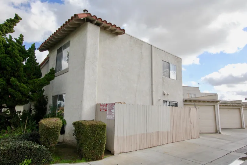 House at the Wes-Grove in Garden Grove with little trees and bushes