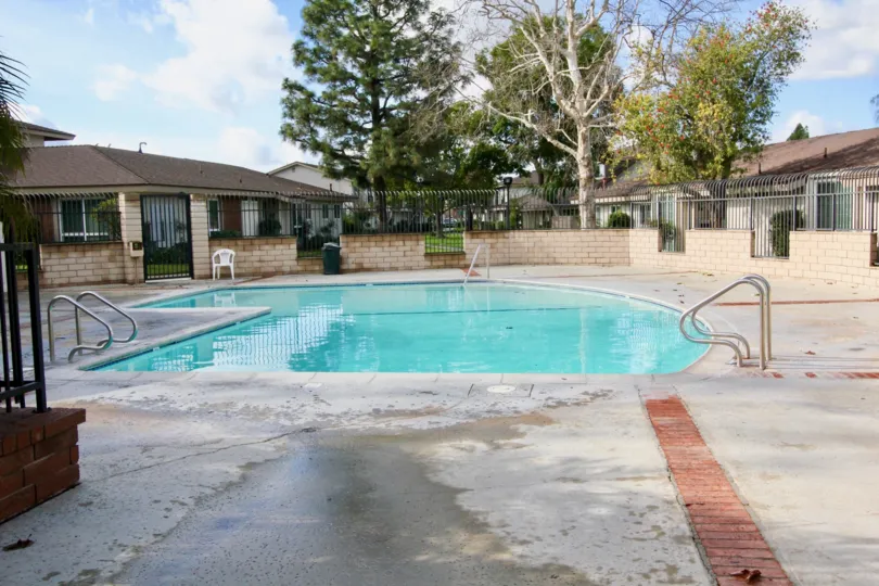 THE HOUSE IN THE WESTBROOK WITH THE SWIMMING POOL, PLANTS, TREES