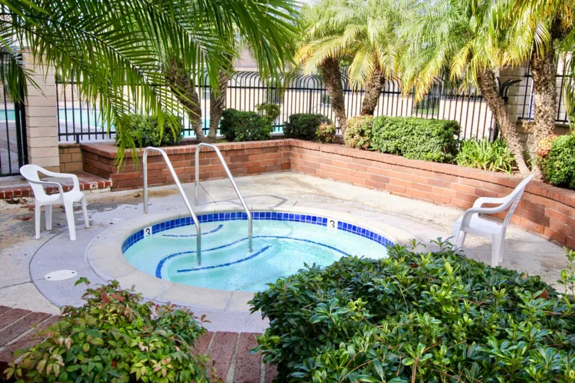 The Westbrook in the Garden Grove with a beautiful Swimming Pool and trees