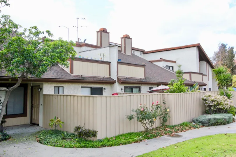THE VILLA SURROUNDED BY THE PLANTS WITH FLOWERS, TREES ARE THERE IN GARDEN GROVE CITY