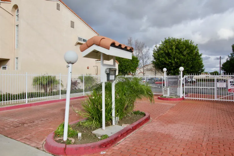 The large entrance of Yorkshire Townhomes with white gate