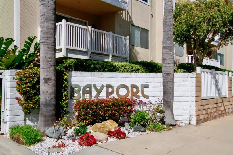 Fabulous looking villa with Name Sign and trees around in Bayport of Huntington Beach