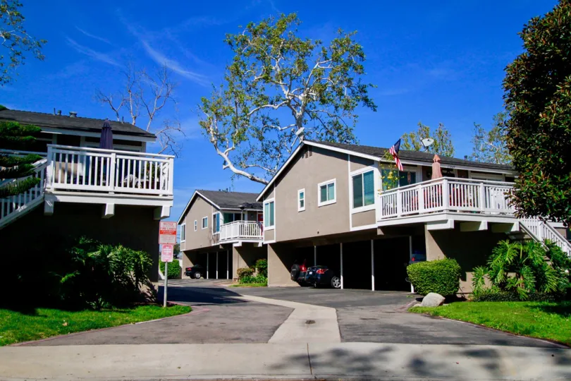 Bayshores California bulding near to another building back side building all home same type same color light gray balcony attached