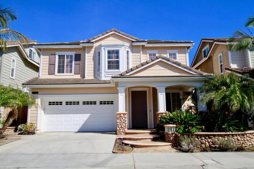 Beachside Huntington Beach California very big house near to near huge hosuse brown color paint very nice