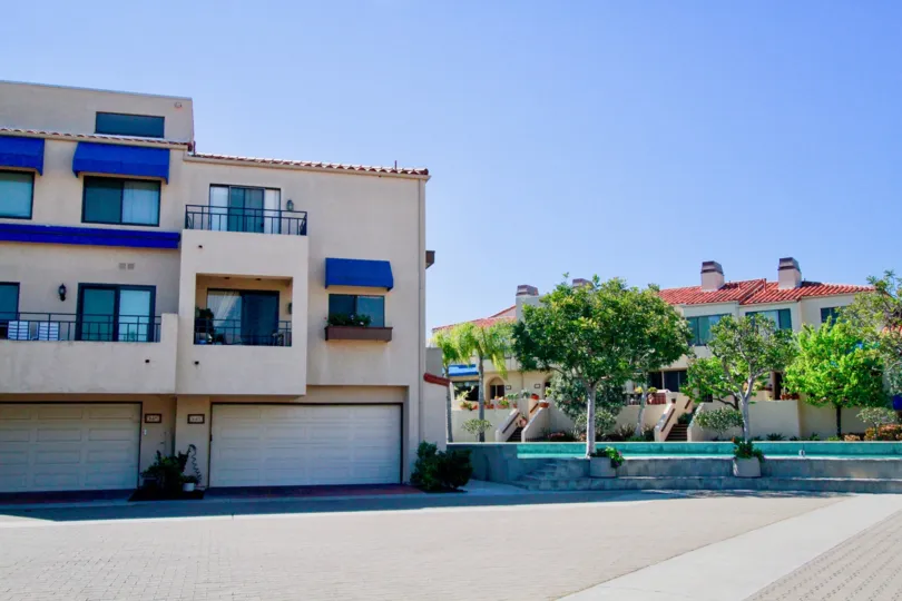 A cement front yard in the residential area of Broadmoor Huntington harbor.