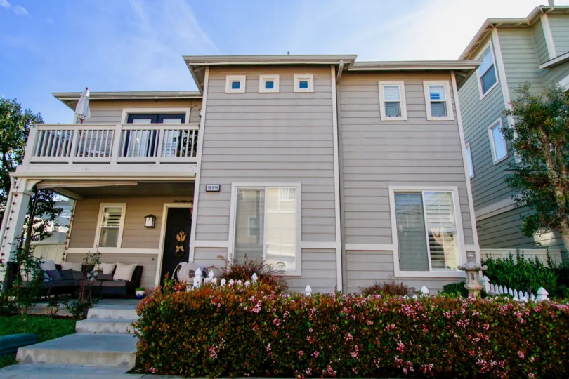 Cape Ann Huntington Beach California tin shaped building clubbed together with line design at front
