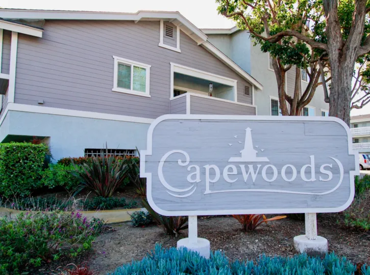 Wonderful Coloured villa with Sign board and trees around in Capewoods of Huntington Beach