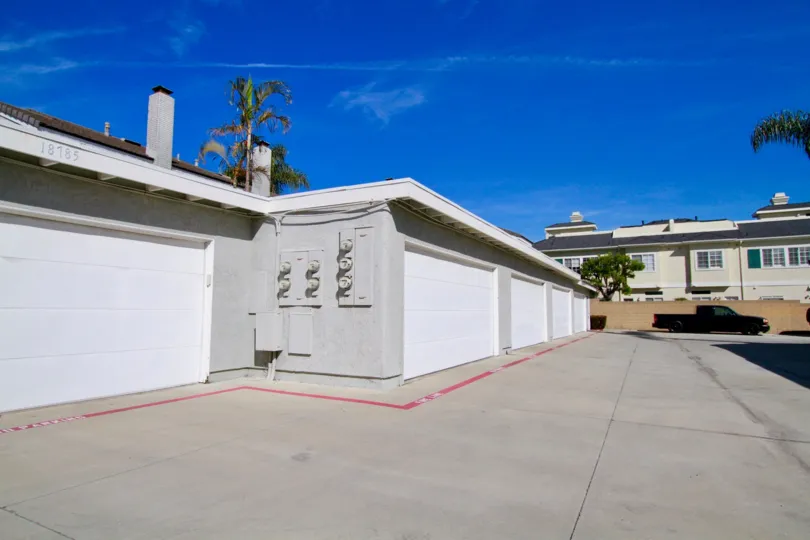 Spacious villas with car parking on a sunny day in Cherrywood Village of Huntington Beach