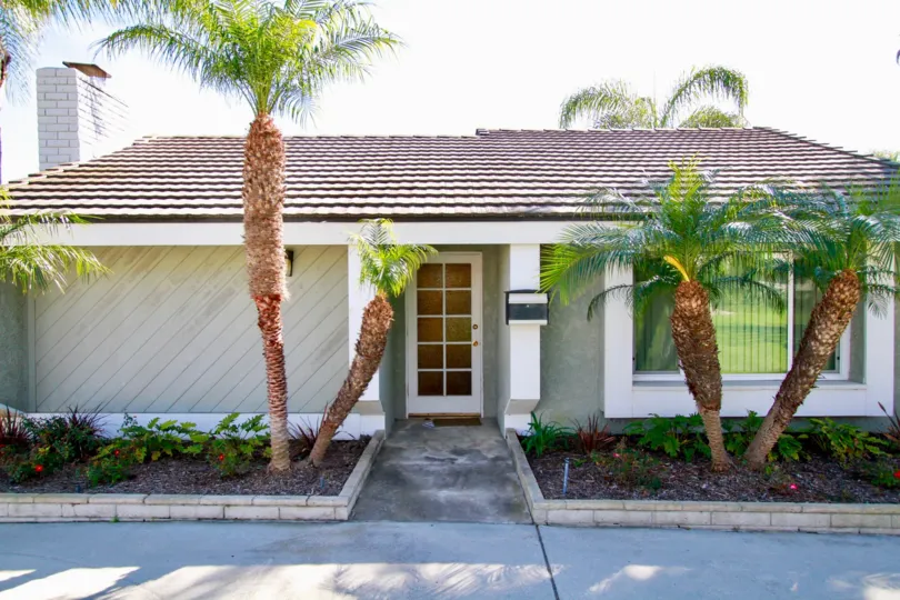 Nice view of Palm trees with entrance of a villa in Cherrywood Village of Huntington Beach