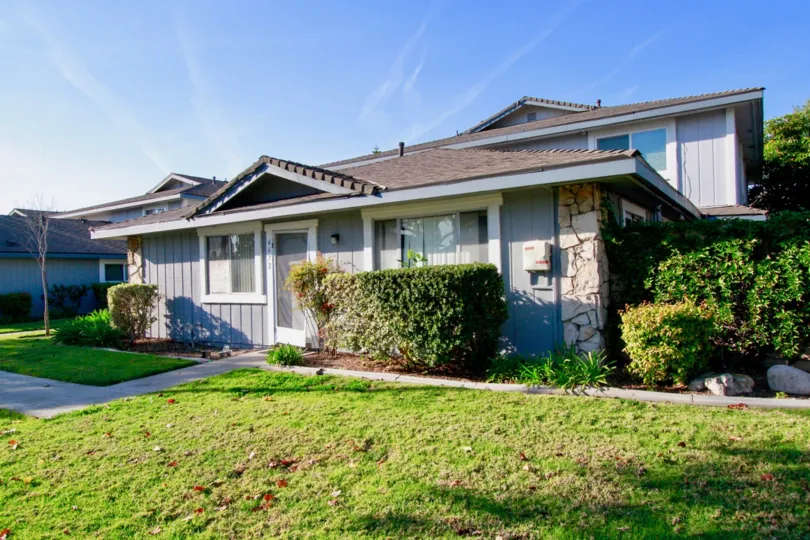 Excellent view of sunshine and villas with lawn in Harbor Heights Villas of Huntington Beach