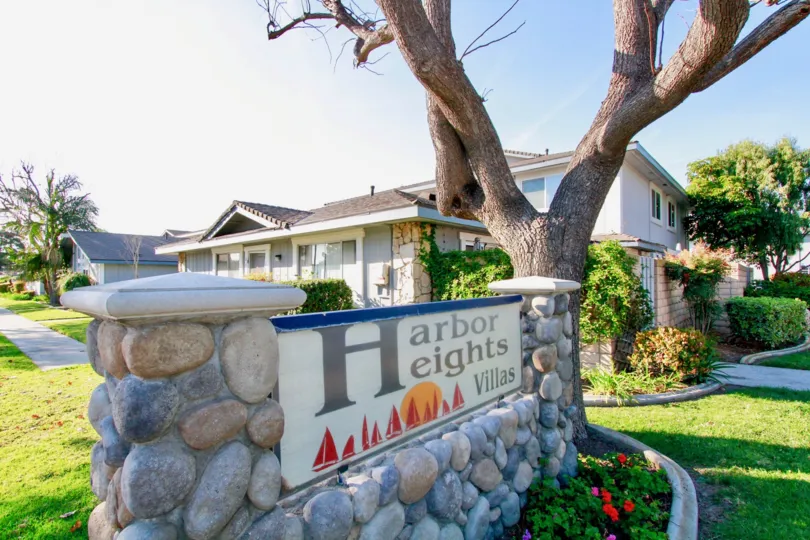 Fabulous view of Trees and Villas with Signboard in Harbor Heights Villas of Huntington Beach