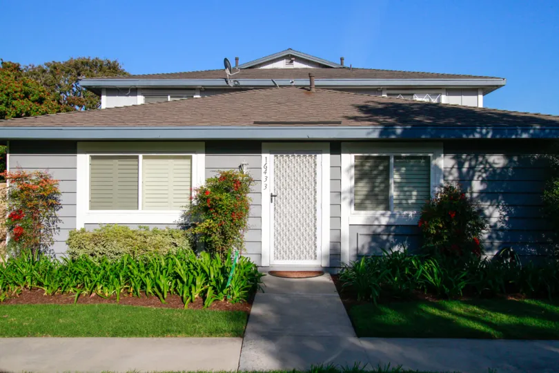 THE BUNGALOW ALONE AND THE DOOR CLOSED BUT BEAUTIFUL GARDENS ALSO AVAILABLE AT BOTH SIDE OF THE HOUSE AND IT LOOKS NICE.