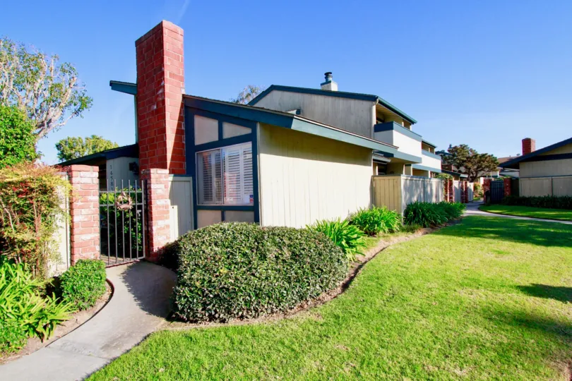 Extraordinary view of green lawn in front of villa in Harbor Pines of Huntington Beach