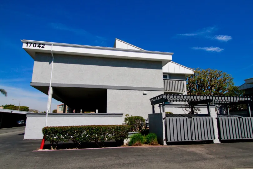Harbour Pacific Huntington Beach California slanting roof with grey painted front small home