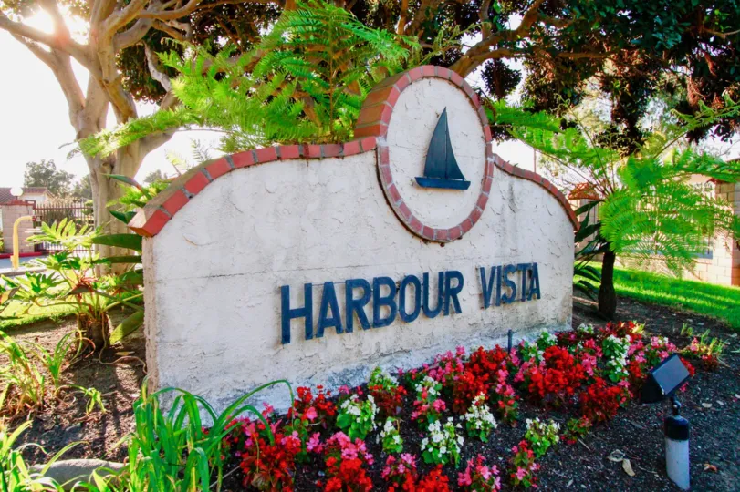 the harbour vista the sign board is backside tree is good in huntington beach in california