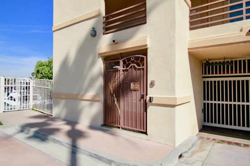 Harbour Bay Club Huntington Beach California front looks like prison model gates with brown color