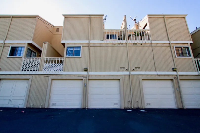 Park in the garages along the streets of Huntington Terrace