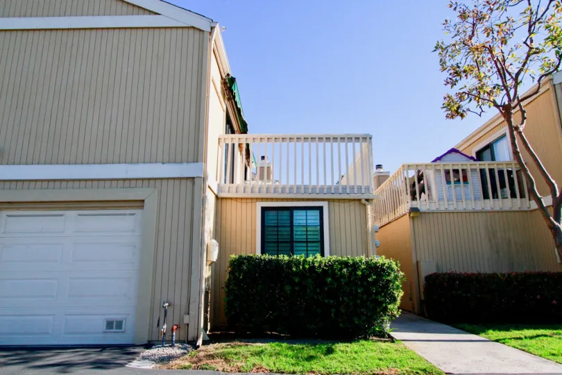 Fabulous view of villa with balcony and trees in Huntington Terrace of Huntington Beach