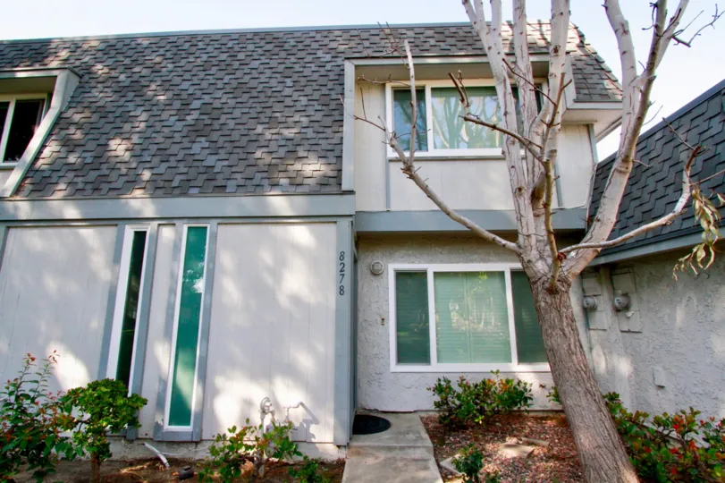 A residential unit with large windows in Mariners Cove west community.