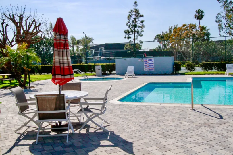 the mariners cove of huntington beach with umberlla in swimming pool of california