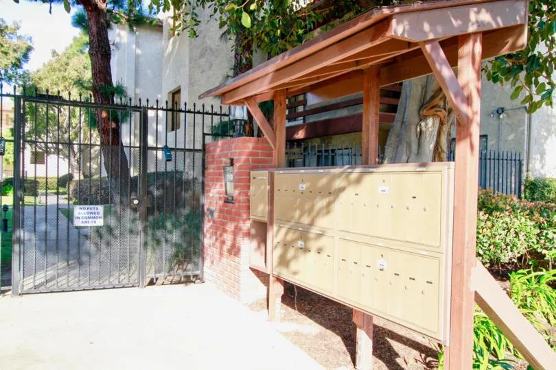 Nice view of Entrance gate and letter boxes of villas in Newman Terrace of Huntington Beach