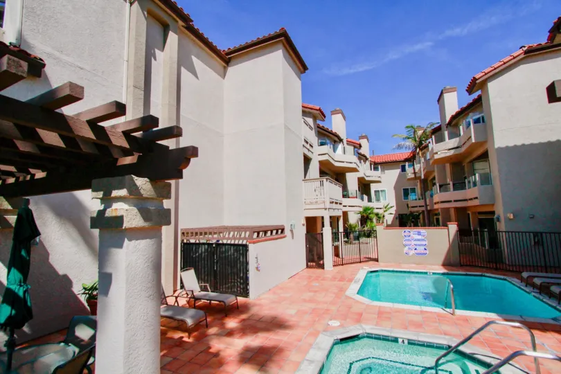 A beautiful residential area with a pool in the center in the Ocean Breeze community.