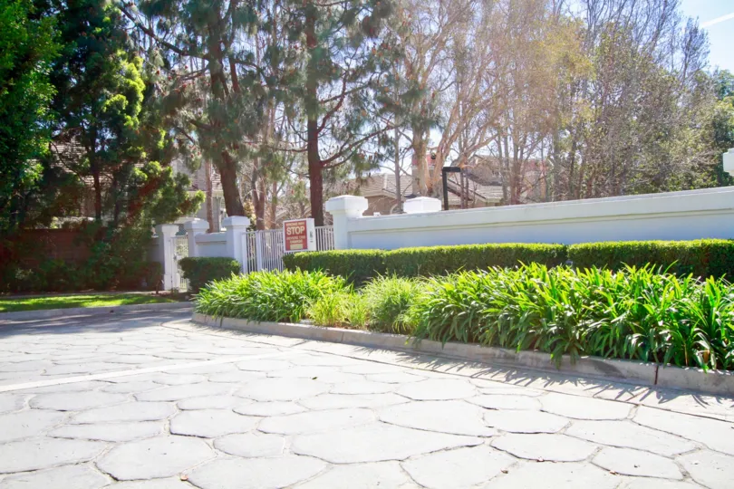 Excellent external view of villas with trees and plants in Pacific Ranch Villas of Huntington Beach