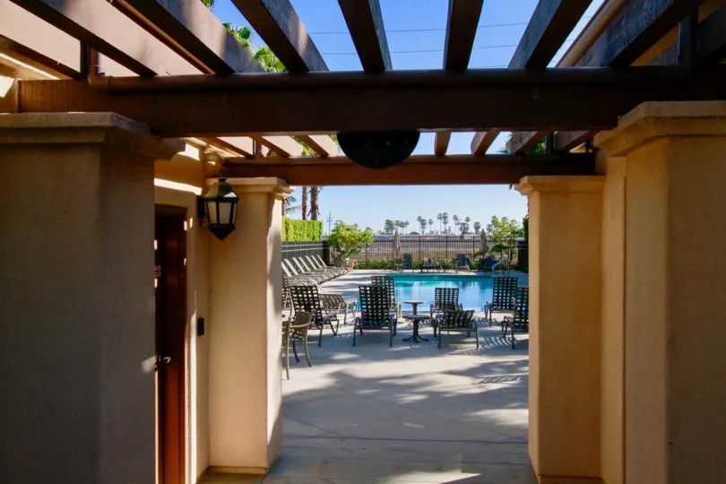 Pacific Shores Huntington Beach California sky appears through grided wooden roofing