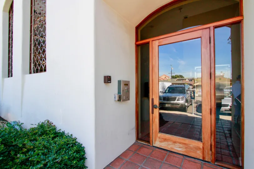 Villa showing nice entrance glass door with car parking in Plaza Almeria of Huntington Beach