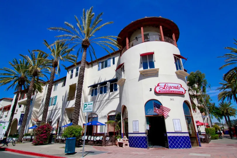 Plaza Almeria Huntington Beach California building shape round and long shape very super white and blue color paint hugge door and window attached