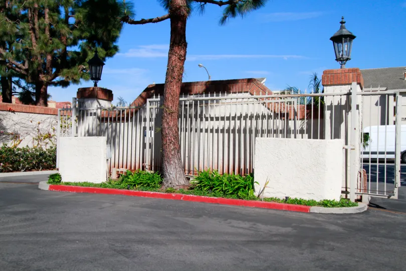 Pointe Surfside Huntington Beach California building fully cover the compount gate not view for the house light attached in the gate