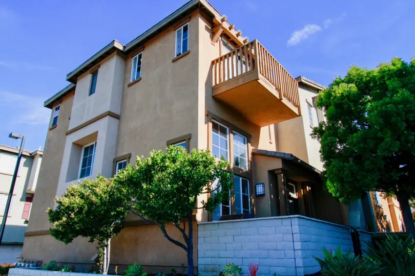 Stand on the deck overlooking the streets of the Huntington Beach community