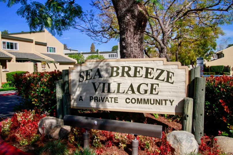Nice Colourful view with community board and trees around in Sea Breeze Village of Huntington Beach