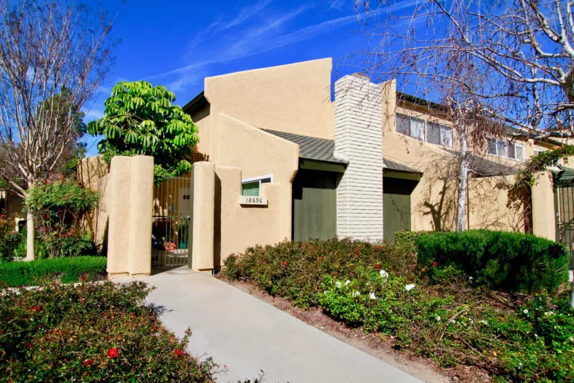 Townhome type complex with a nice walk way up to the home