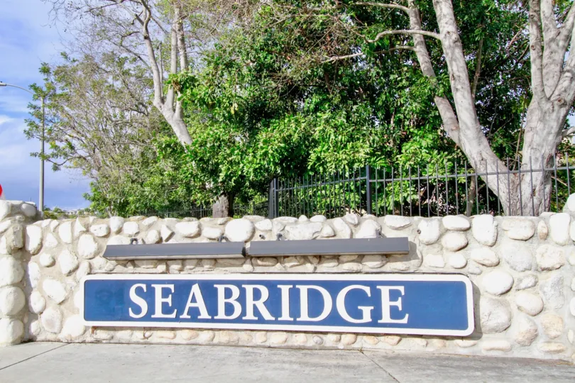 THE SEABRIDGE VILLAS THE SIGN BOARD IS DESIGN FOR ROCKS IS NICE IN HUNTINGTON BEACH IN CA