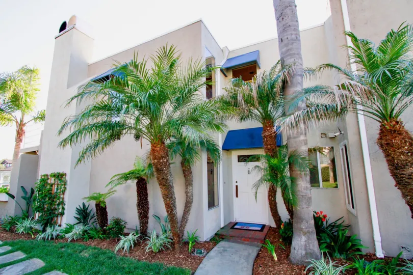 A huge building in the Seabridge with trees and plants.