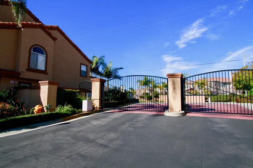 Gated community dwellings in seacliff palms of Huntington Beach California Favulous landscaping and Spanish Flaire