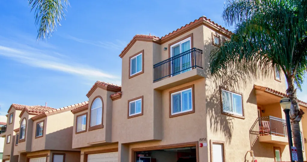 Seacliff Palms apartment buildings with garages and balconies.