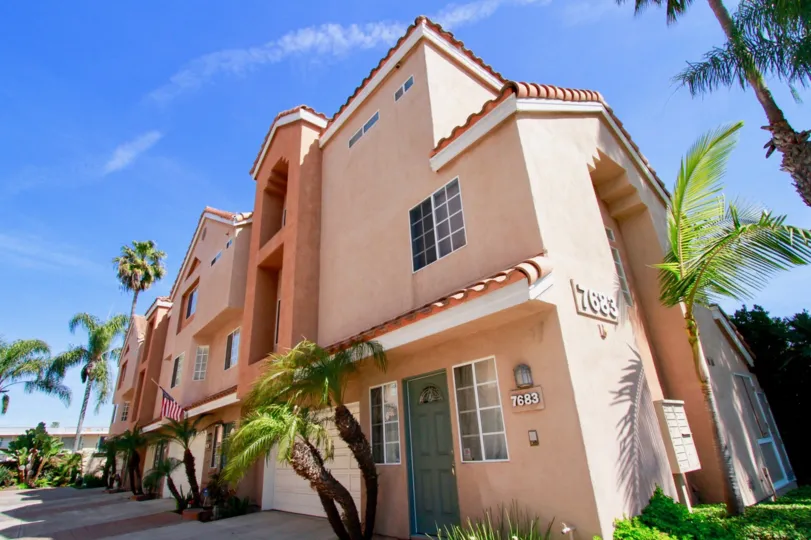 Solimar Huntington Beach California building is light rose and brown color paint apply window and glass attached side steps attached door color gary
