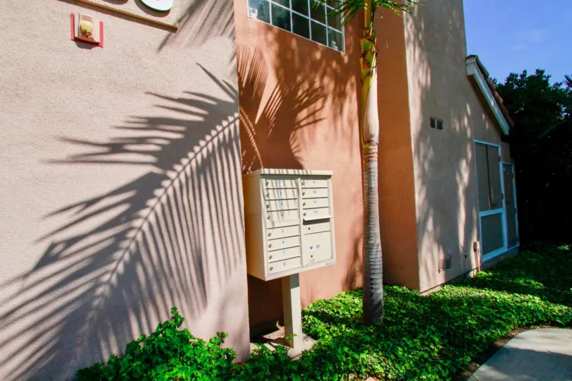 community mailbox located near some type of residential building