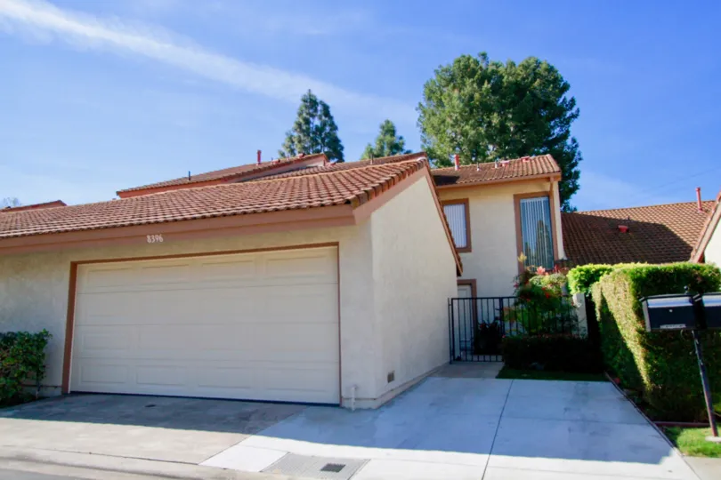 a house has a long car sheld which is used to park a little truck is sutivated in springhurst of huntington beach california